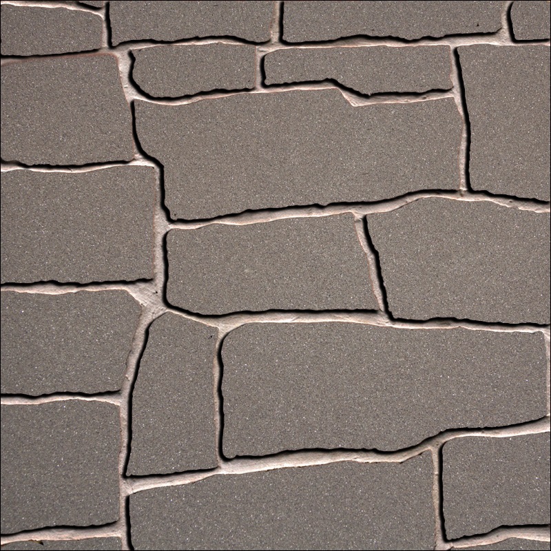 Ohebný kamenný obklad čistě šedé barvy připomínající lesklý světlý beton.