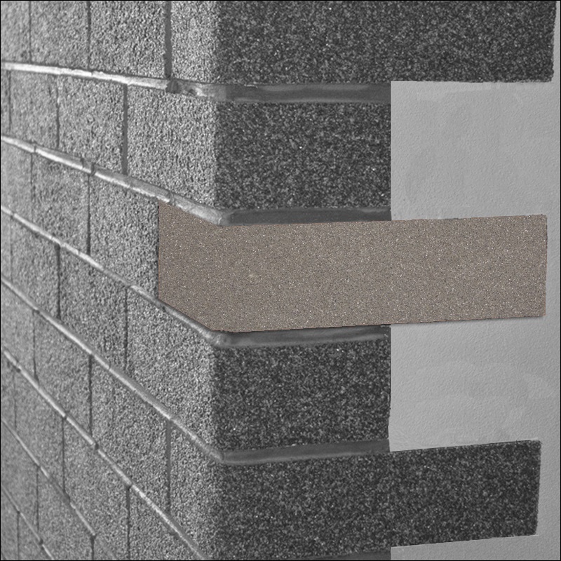 Ohebný kamenný obklad čistě šedé barvy připomínající lesklý světlý beton.